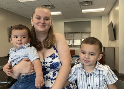 Photo of Samantha and her two sons.